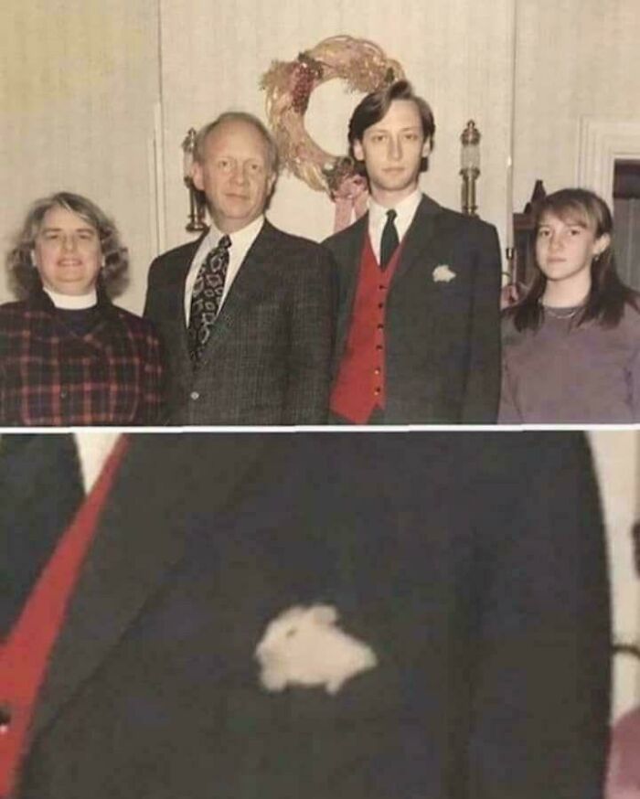 Family photo with a man wearing a suit that has a white bunny in the pocket, part of funny pictures that go hard collection.