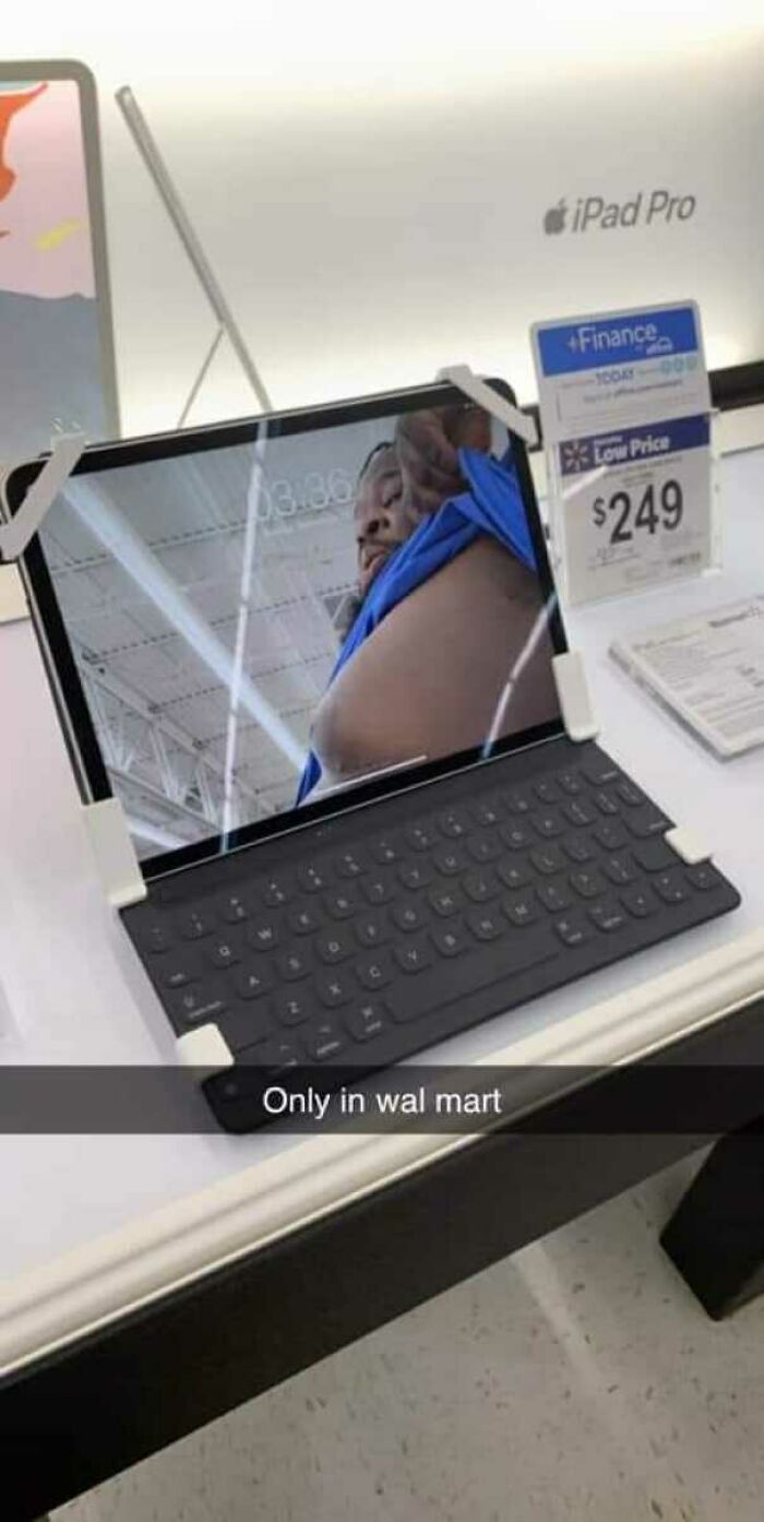 Tablet display at Walmart showing an unusual screen reflection, highlighting one of the wildest People of Walmart moments.