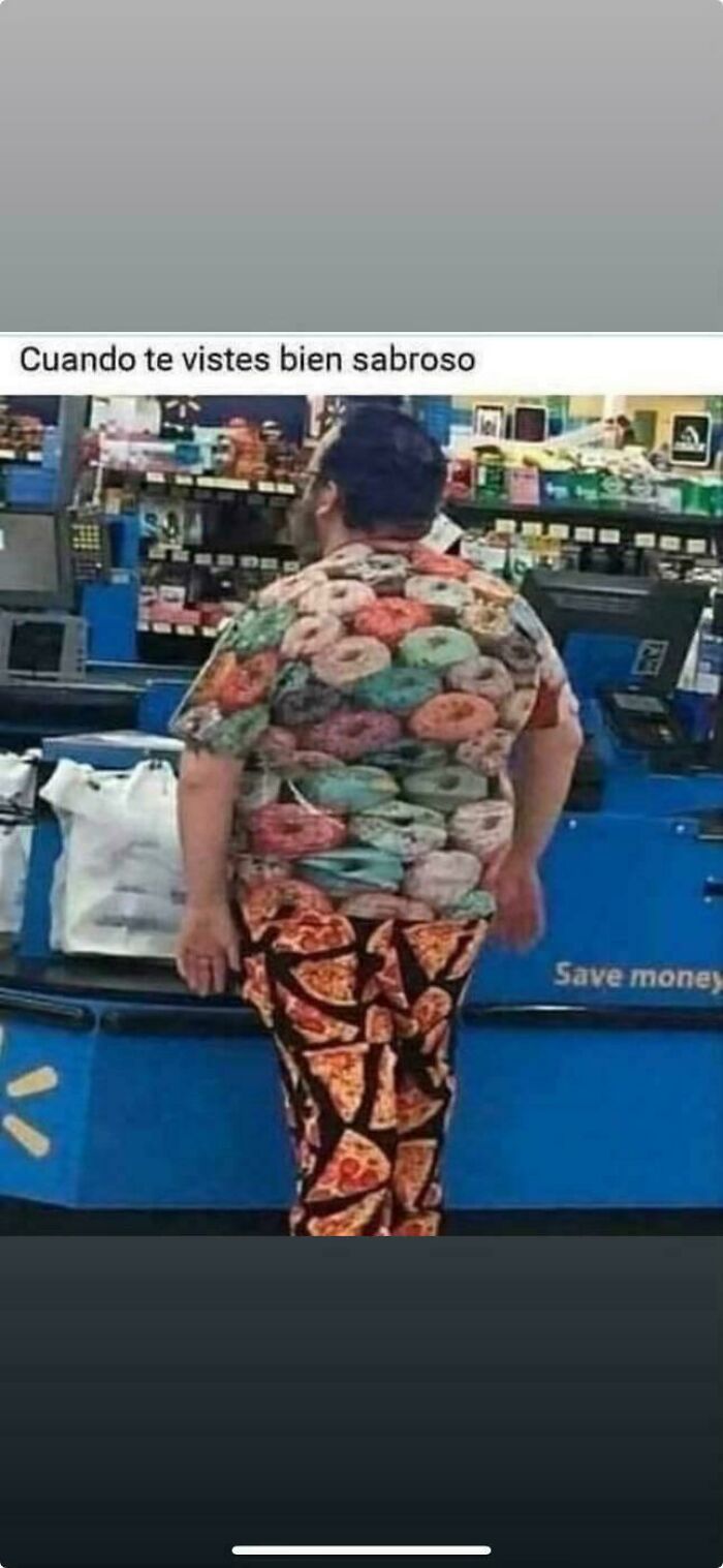 Man wearing a colorful donuts shirt and pizza pants standing at a Walmart checkout counter in a casual setting.