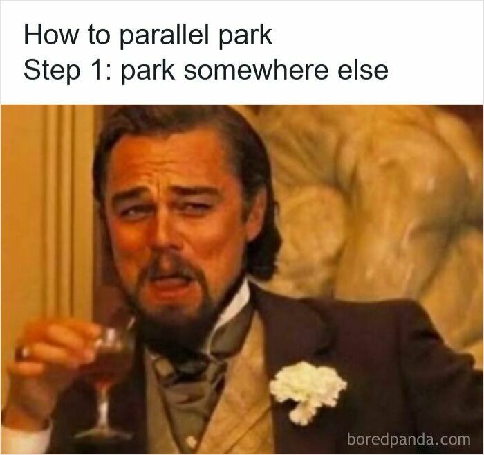 Man in vintage suit holding a drink with sarcastic expression and meme text about parallel parking driving memes.