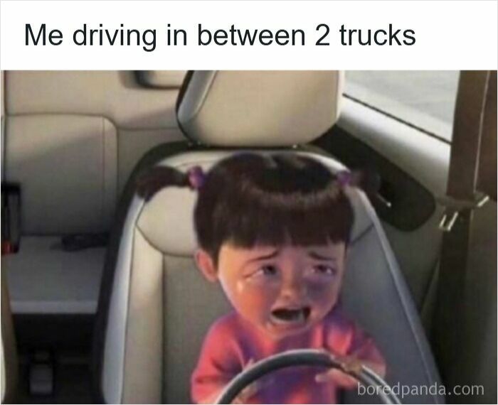 Crying animated child driving between two trucks, illustrating frustration in hilarious driving memes about road rage.