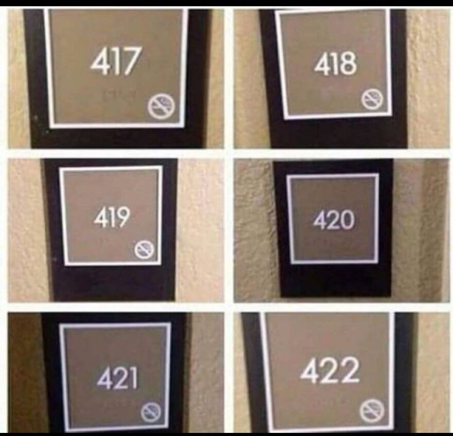 Room number signs from 417 to 422, with one sign deliberately tilted, showing people knew exactly what they were doing.