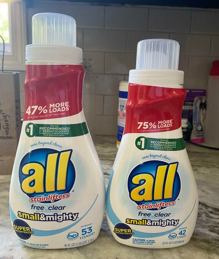 Two bottles of All stainlifters detergent on a countertop illustrating sneakflation with different load amounts and sizes.