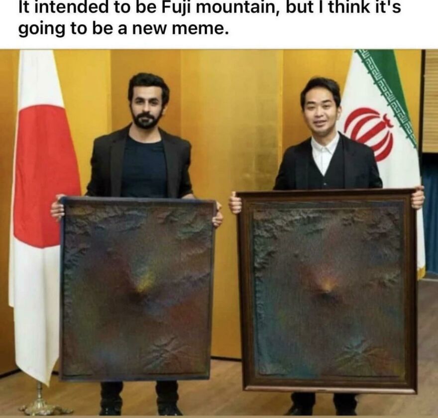 Two men standing with textured paintings in front of Japan and Iran flags showing people knew exactly what they were doing.
