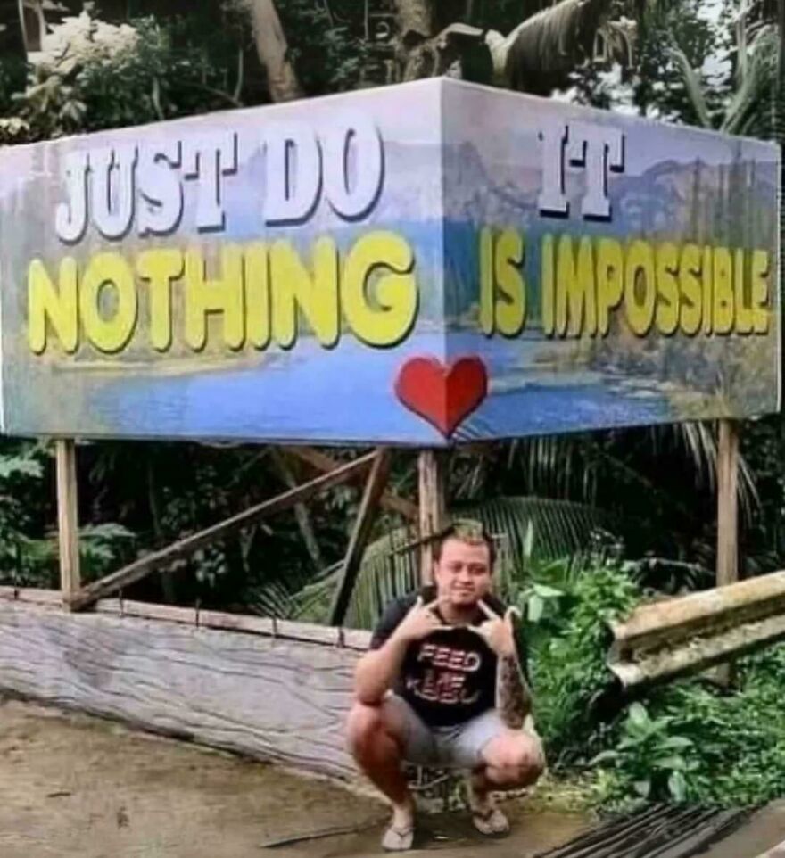 Man squatting under a misleading sign, showcasing humor in moments people knew what they were doing and still went for it.