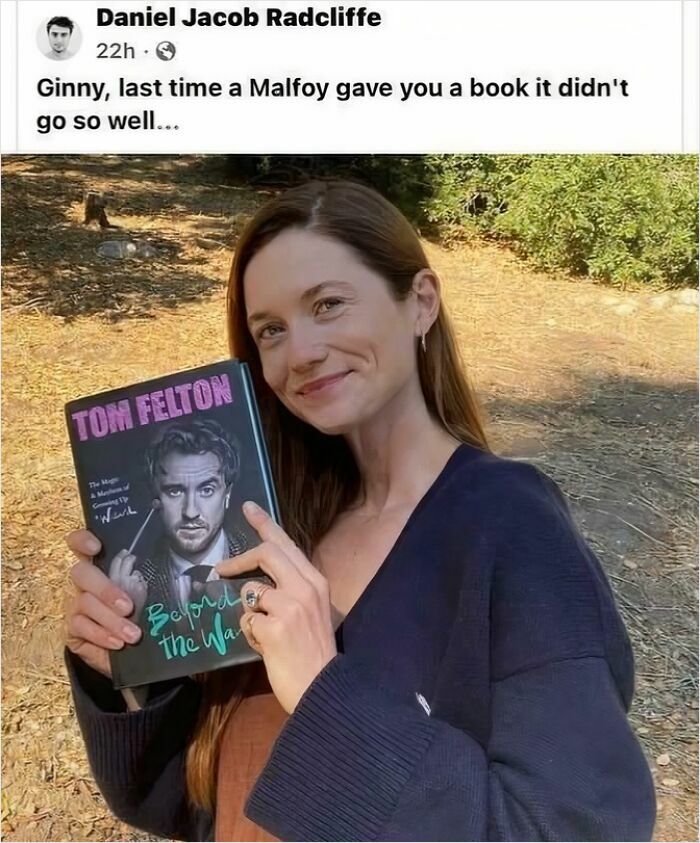 Woman smiling outdoors holding a humorous Harry Potter book in a meme about Malfoy, perfect for Gryffindor common room fans.