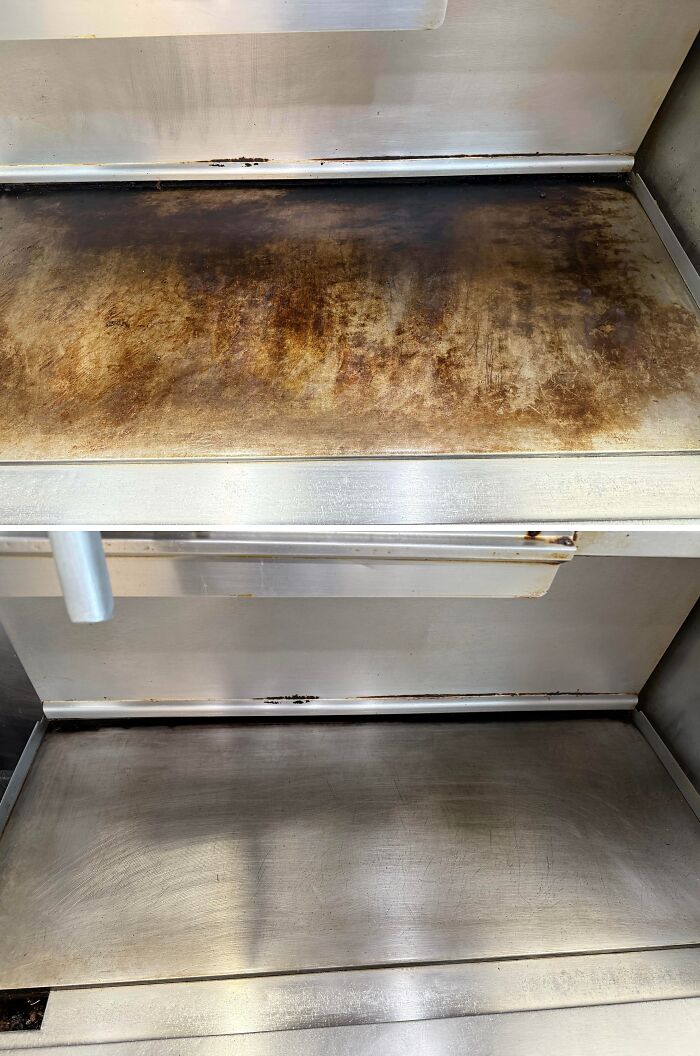 Before and after cleaning photos showing a heavily stained oven surface restored to shiny stainless steel condition