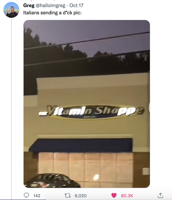 LED sign of a vitamin shop with some letters not fully lit causing an unintended message at night.