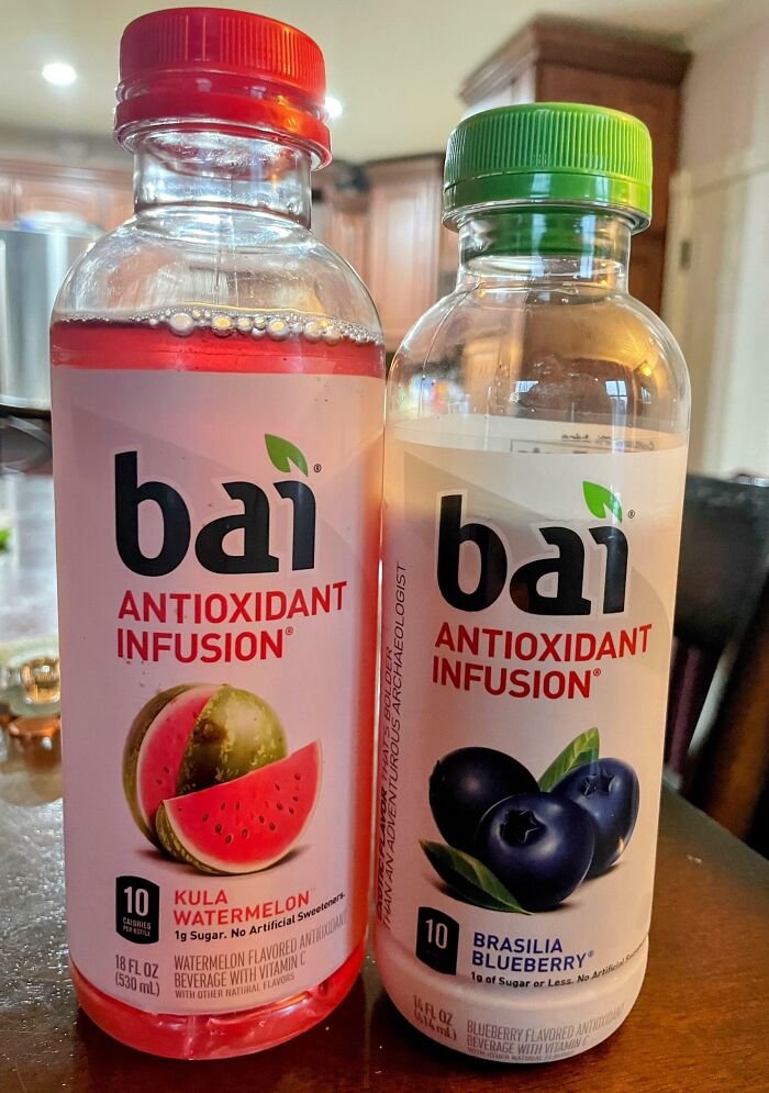 Two Bai antioxidant infusion bottles, watermelon and blueberry flavors, highlighting sneakflation in beverage packaging.