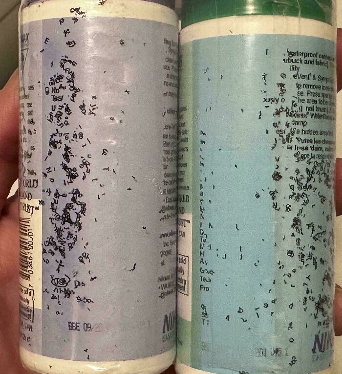 Close-up of bottles with disintegrating printed text, an interesting pic that answers questions you didn’t know you needed to ask.
