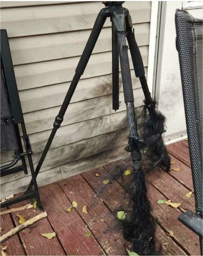 Burned tripod legs outdoors showing damage and residue, illustrating unexpected effects in interesting pics collection.