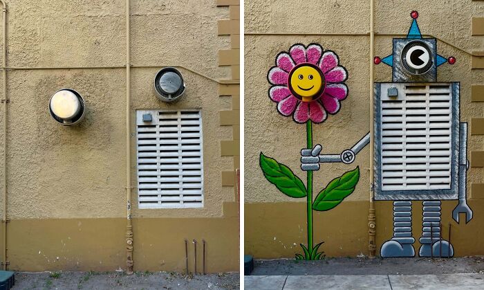 Street art by Tom Bob showing urban whimsy with a robot holding a smiling flower, transforming ordinary wall fixtures.
