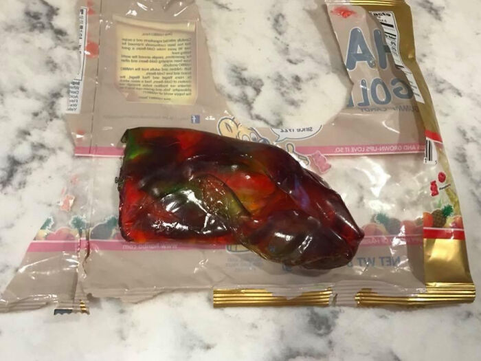 Colorful melted gummy candy on plastic packaging, illustrating an interesting pic that answers curious questions.