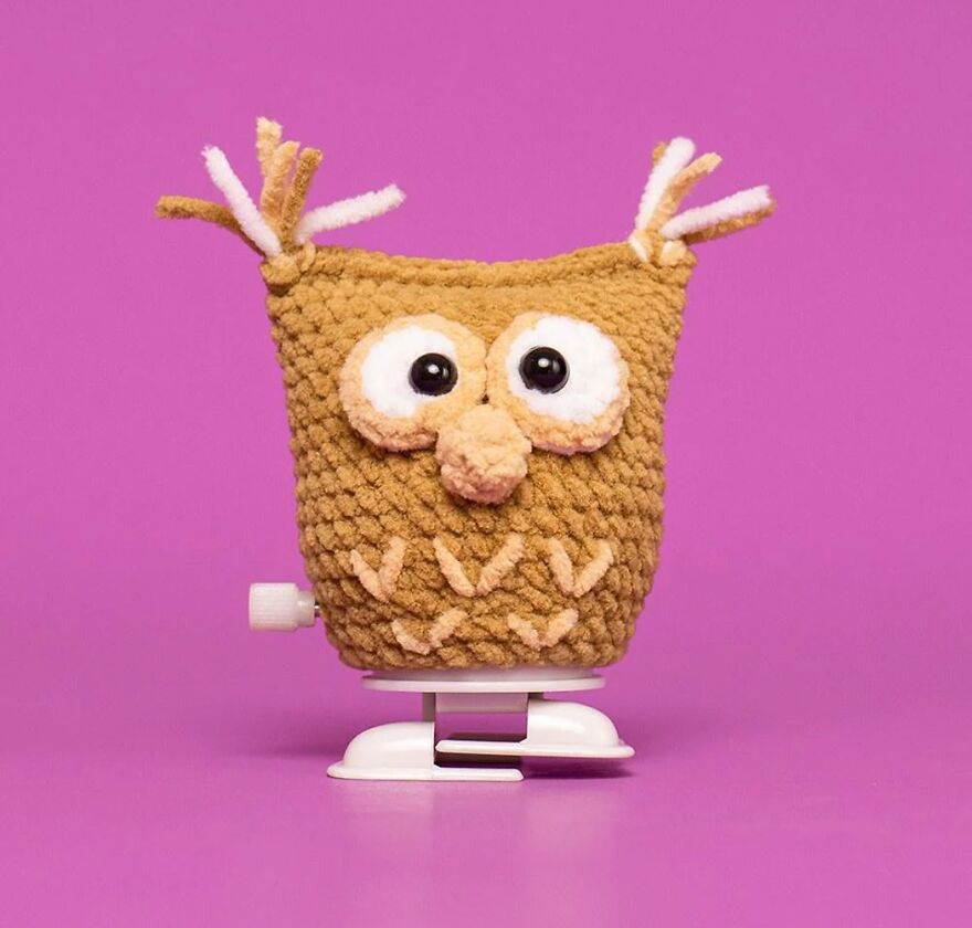 Crochet animal owl with big eyes and textured yarn body on a pink background, showcasing crochet animals with personality.