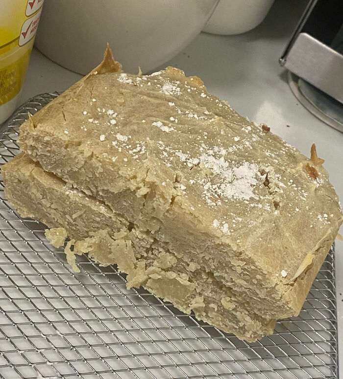 Failed baking attempt with crumbly dough and c*****d surface, showing how today feels like a total mess moment.