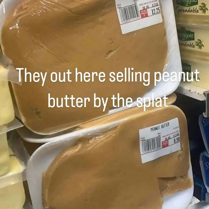 Large containers of peanut butter displayed in a store with visible price labels, suggesting unusual packaging need for exorcist.