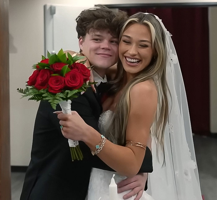 Couple dressed in wedding attire embracing with a bouquet, illustrating disturbing new details after adult star split from YouTube prankster.