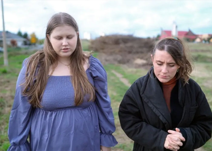 Two women outdoors appearing thoughtful, related to woman who believed she was Madeleine McCann in court testimony.