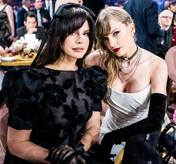 Taylor Swift with friend at an event, showcasing glam style while sparking rumors about hidden jabs in her new music video.