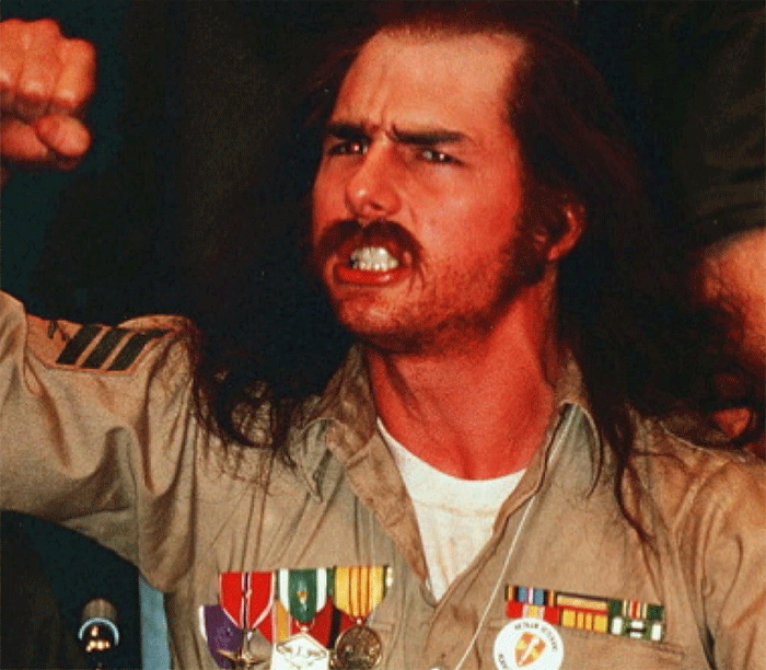 Emilio Estevez in a vintage military uniform with medals, expressing intense emotion during a dramatic moment. Emilio Estevez in a vintage military uniform with medals, expressing intense emotion during a dramatic moment.