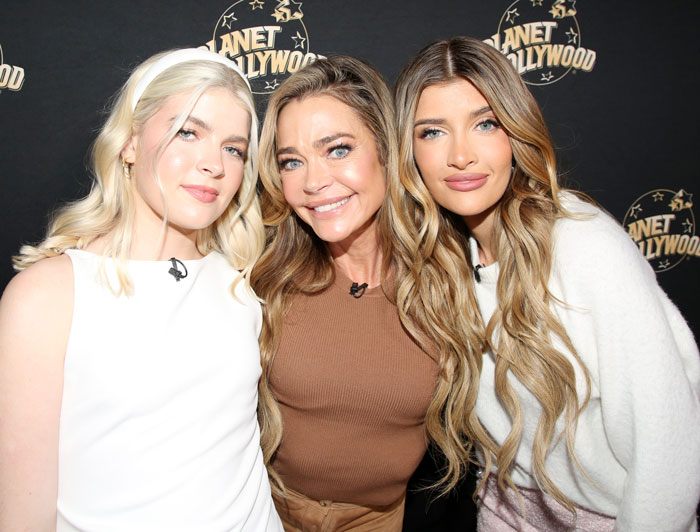 Charlie Sheen's daughter smiling with two women at a Planet Hollywood event showing before and after plastic surgery results.