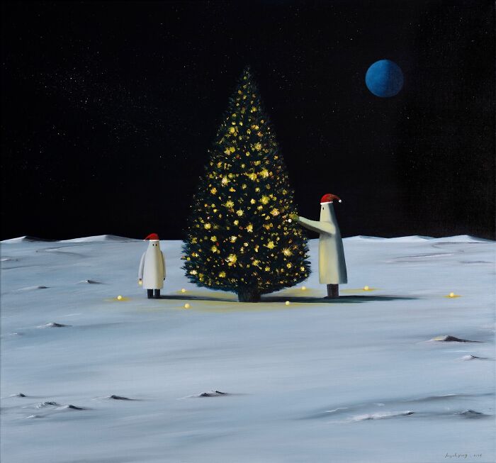 Surreal winter scene by Zhiyong Jing with figures in Santa hats decorating a glowing tree under a dark sky and blue moon.