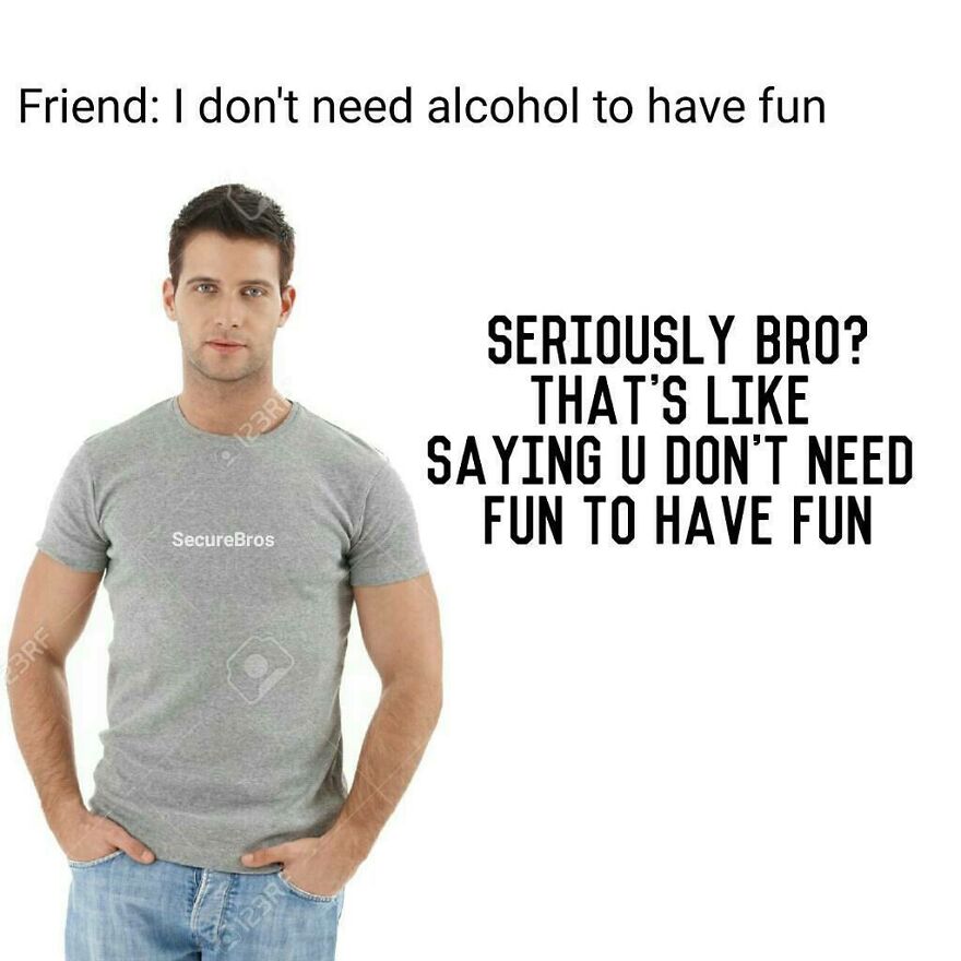 A man in a gray t-shirt making a funny comment about having fun, highlighting alpha males humor and playful sarcasm.