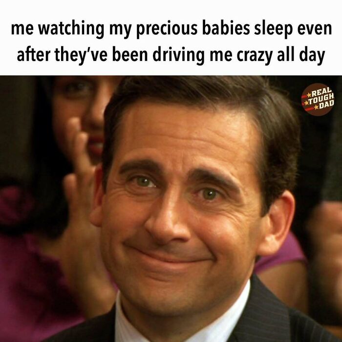 Smiling man representing relatable parenting memes about watching babies sleep after a long, crazy day of parenting challenges.