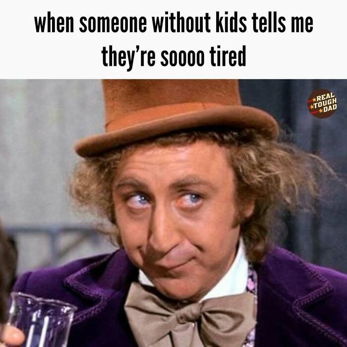 Man in a purple jacket and brown top hat making a sarcastic face about relatable parenting memes and tired parents.