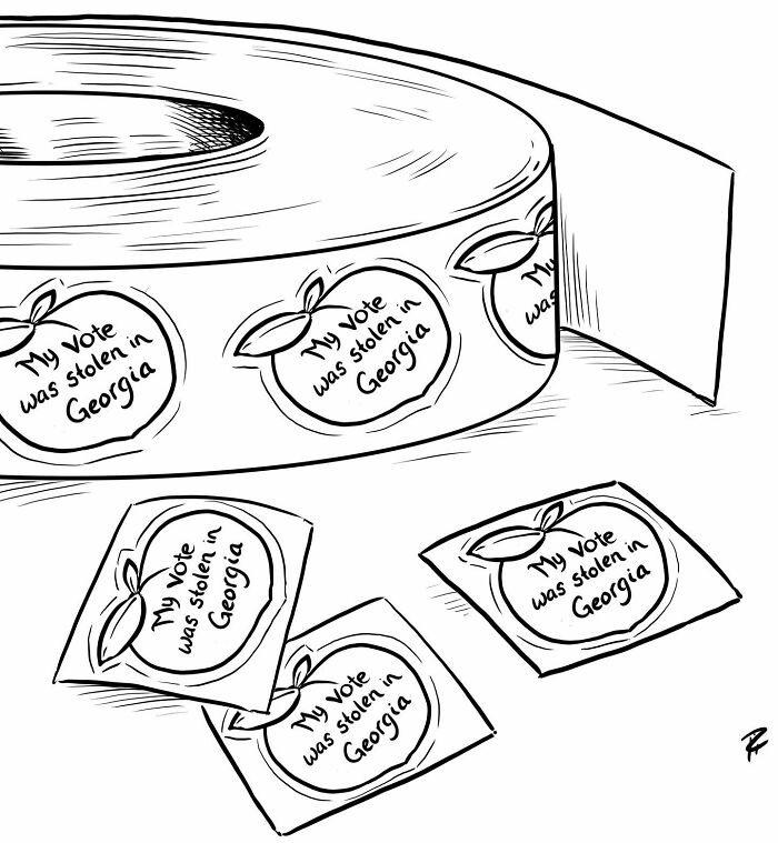 Roll of stickers and loose stickers with the phrase My vote was stolen in Georgia, comics sparking conversations.