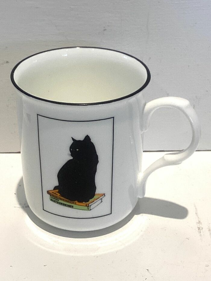 Black Cat Mug By Sue Boettcher. Got Two Of These Left, Used To Have Four, I Think. Lovely Fine Bone China. Must Be 35 Years Old By Now