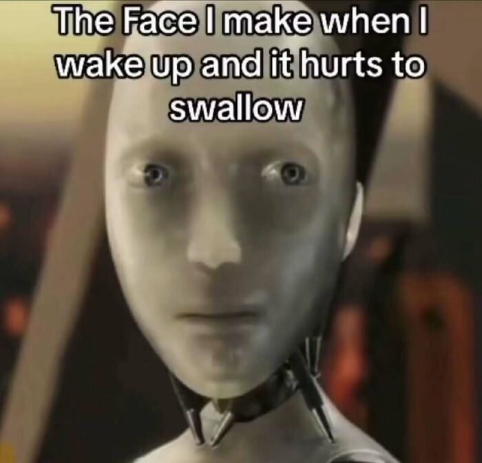 Robot with a blank expression and caption about waking up and pain, illustrating unhinged memes for 3AM posts.