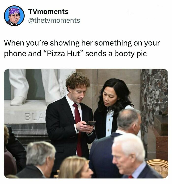 TV meme showing a man and woman looking at a phone with a funny unexpected message, capturing relatable TV moments.