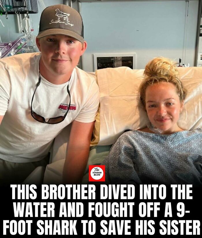 Brother and sister smiling in hospital bed after brother fought off a 9-foot shark in an adorable wholesome post.