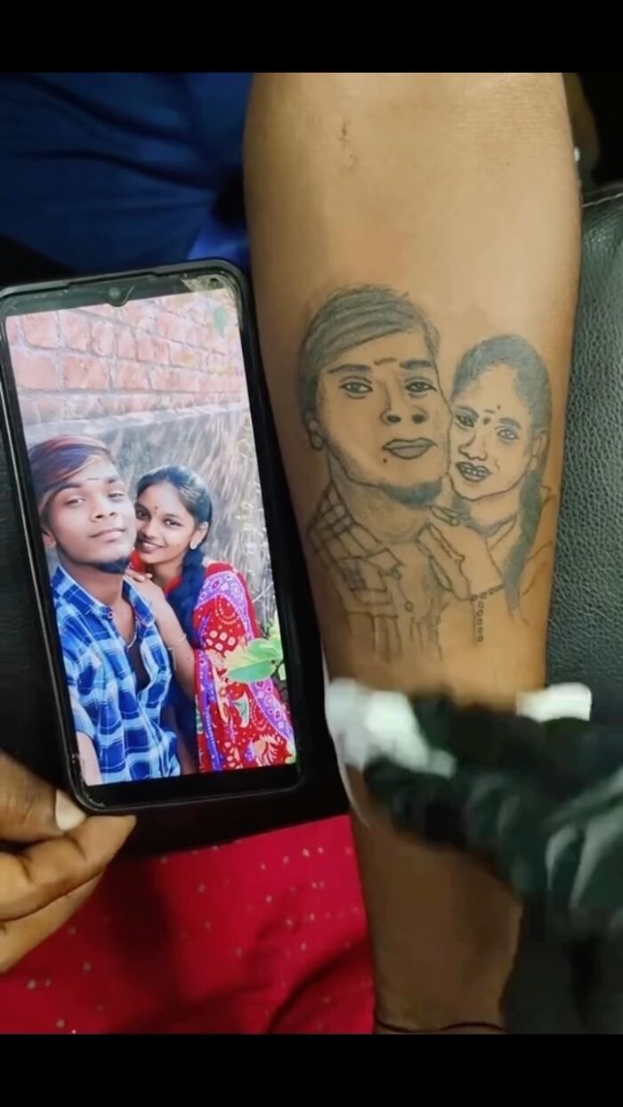Tattoo artist recreating an awkward couple portrait tattoo from a phone photo, showing awful tattoos and poor decisions.