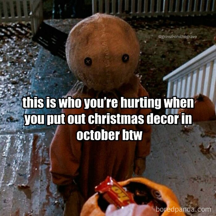 Hilarious horror movie meme with a creepy figure warning about putting out Christmas decor in October.