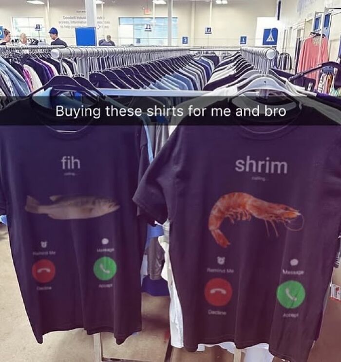 Two funny shirts with "fish" and "shrimp" text, displayed in a clothing store, fitting unhinged memes at 3AM theme.