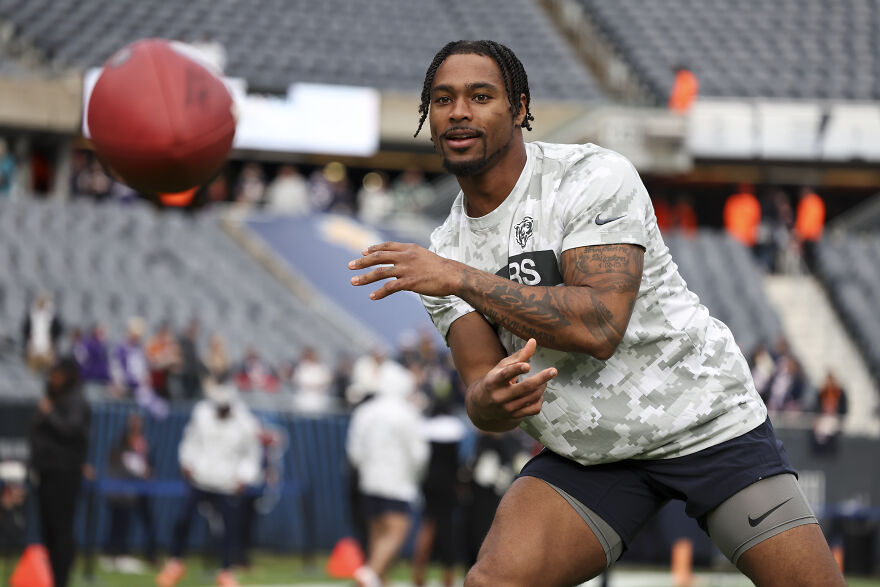Jonathan Owens practicing football on the field, showcasing athletic skills and net worth growth in sports. Jonathan Owens practicing football on the field, showcasing athletic skills and net worth growth in sports.