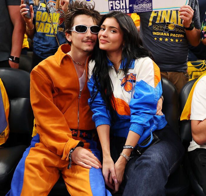 Timoth&eacute;e Chalamet and Kylie Jenner at a basketball game, capturing viral sympathy moments from their date.