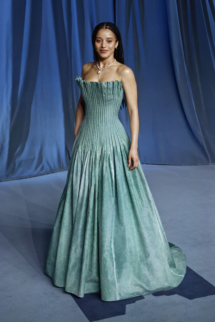 Woman in a strapless teal gown posing elegantly showcasing must-see looks at the 2025 Academy Museum Gala red carpet event