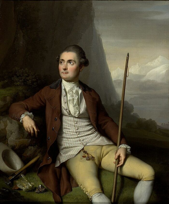 Portrait of a man in 18th-century clothing seated outdoors, illustrating unbelievable facts about their countries.