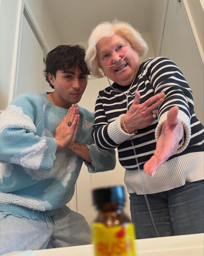 Young man and elderly woman posing indoors as man travels to Europe to discover grandmother's mysterious lockbox contents.