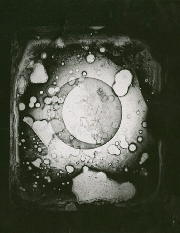 Abstract black and white image showing an experimental photo from the early days of photography.