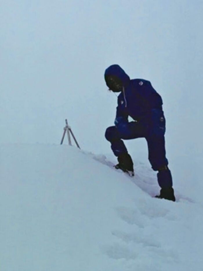 Person in 1980s style snow gear posing on snowy hill, showcasing the wild and wonderful 1980s fashion.