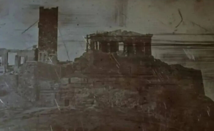 Ancient ruins of a world capital captured in a black and white historic photo showing the city way before modern times.