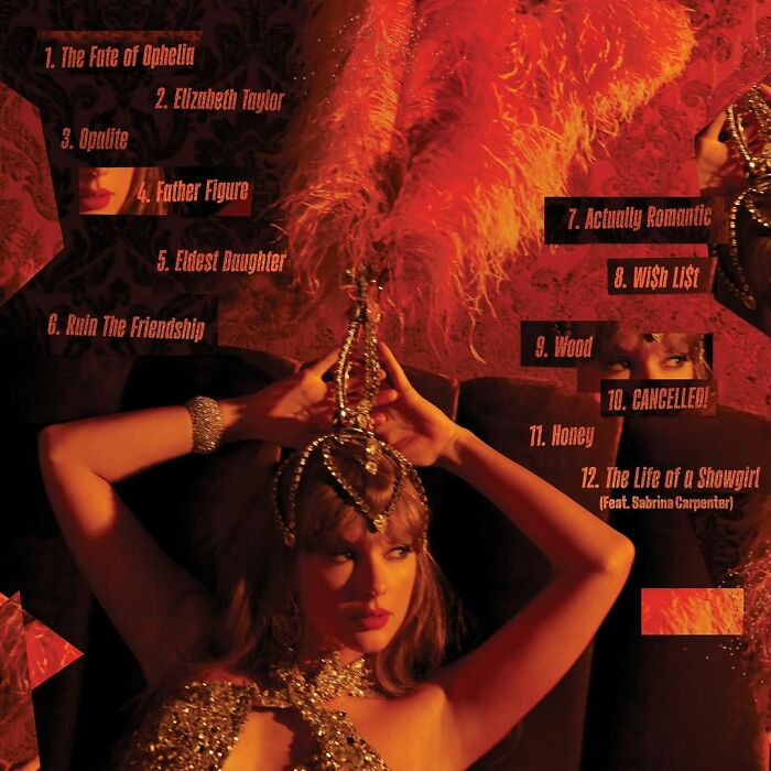 Taylor Swift in ornate outfit holding a jeweled hairbrush amid dark red background and feathered decor.