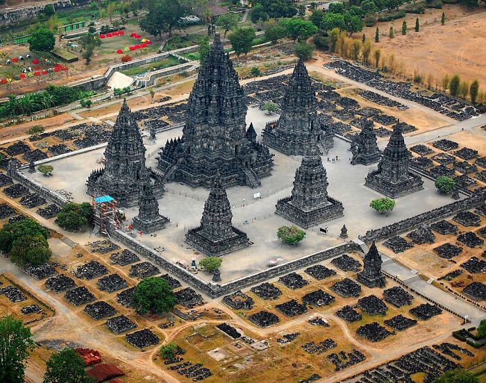 Aerial view of an ancient temple complex captured through Harjanto Sumawan’s lens showcasing life’s beauty.