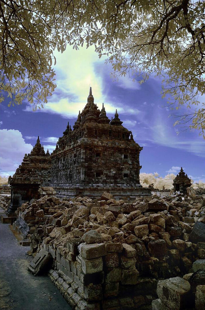 Ancient temple ruins under a vibrant sky, captured through Harjanto Sumawan’s lens showcasing life’s beauty in candid photos.
