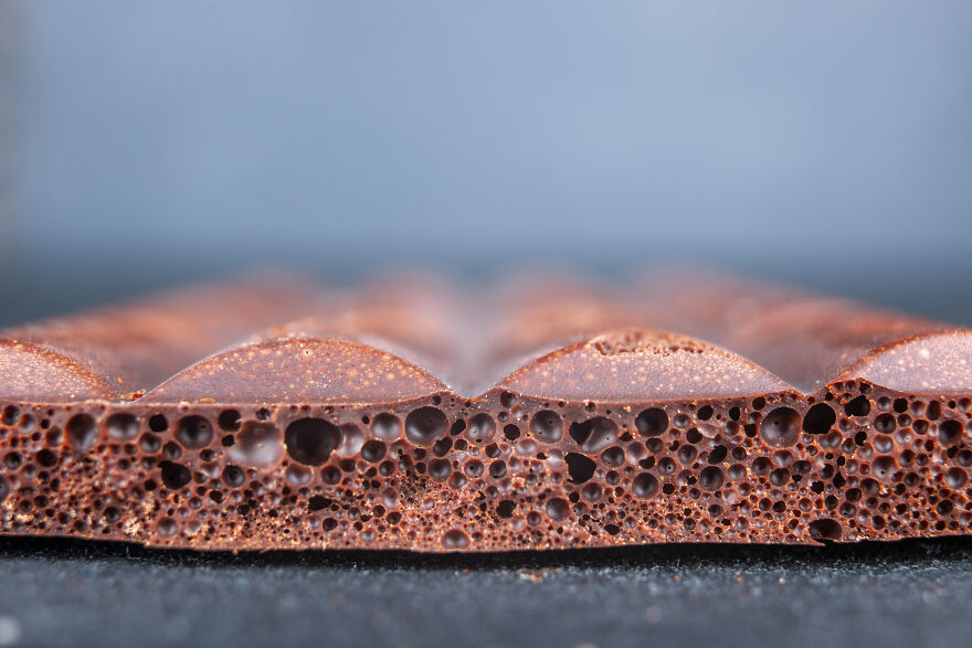 Close-up of porous chocolate texture showing small holes that may trigger trypophobia brain reactions to tiny holes.