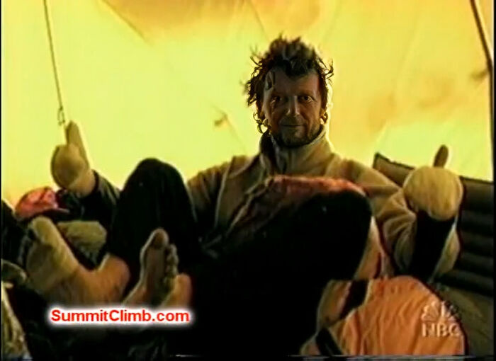 Man sitting inside a tent with relaxed posture, related to rabbits once attacked Napoleon historical story.